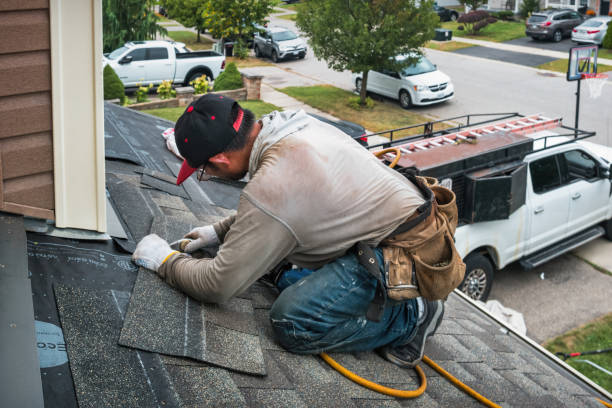 Professional Roofing technician working in Nashua, NH